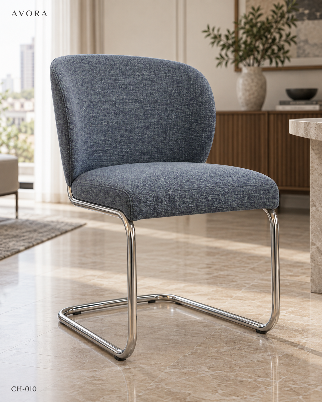 Dusty blue upholstered cantilever chair concept with polished metal frame