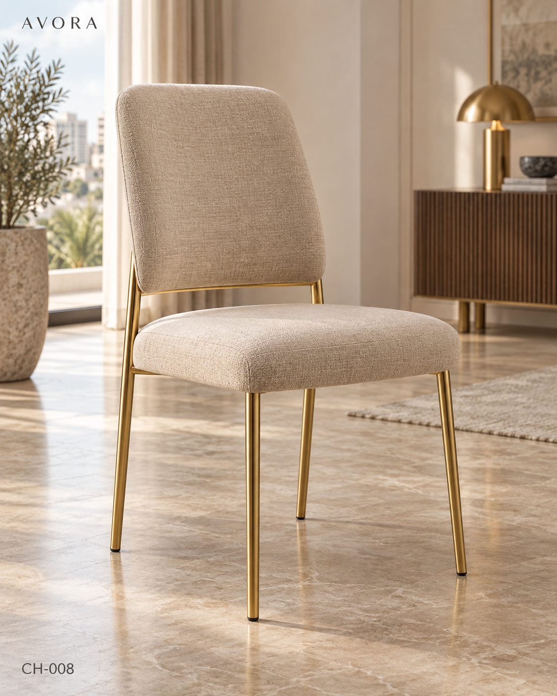 Sand upholstered dining chair concept with gold-tone metal frame